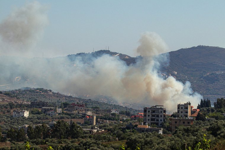 TOPSHOT - Smoke billows from a site targeted by the Israeli military in the southern Lebanese border village of Kafr Kila on July 29, 2024, amid ongoing cross-border clashes between Israeli troops and Hezbollah fighters. Fallout from the Gaza war is regularly felt on the Israel-Lebanon frontier, where deadly cross-border exchanges have escalated between Israeli troops and mainly Hezbollah fighters. (Photo by Rabih DAHER / AFP) (Photo by RABIH DAHER/AFP via Getty Images)