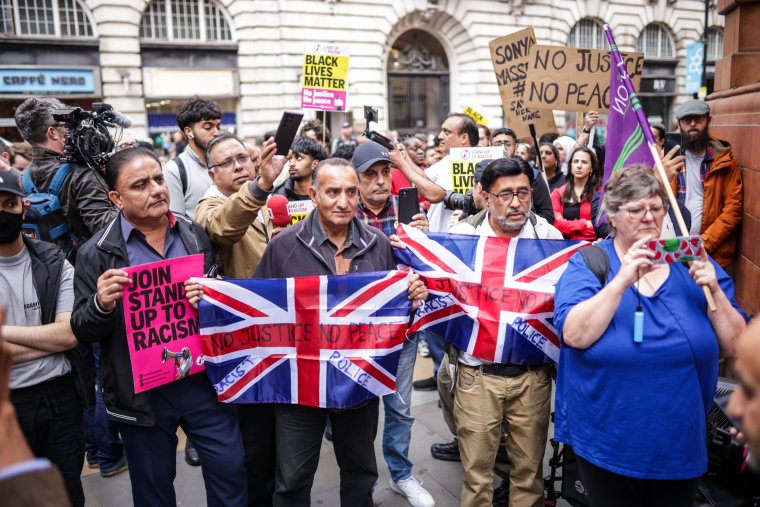 A Stand Up To Racism demonstration in Manchester after a police officer was suspended after a video which appeared to show a man being kicked as he lay on the floor. Footage shared on social media, said to have been filmed at Manchester Airport's terminal two on Tuesday, appeared to show a Greater Manchester Police (GMP) officer kick and stamp on the head of a man who was lying face down on the floor. Picture date: Thursday July 25, 2024. PA Photo. See PA story POLICE Airport. Photo credit should read: James Speakman/PA Wire