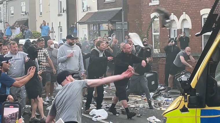 Trouble flares during a protest in Southport, after three children died and eight were injured in a "ferocious" knife attack during a Taylor Swift event at a dance school on Monday. A 17-year-old male from Banks, Lancashire, has been arrested on suspicion of murder and attempted murder over the incident. Picture date: Wednesday July 31, 2024. PA Photo. See PA story POLICE Southport. Photo credit should read: Richard McCarthy/PA Wire