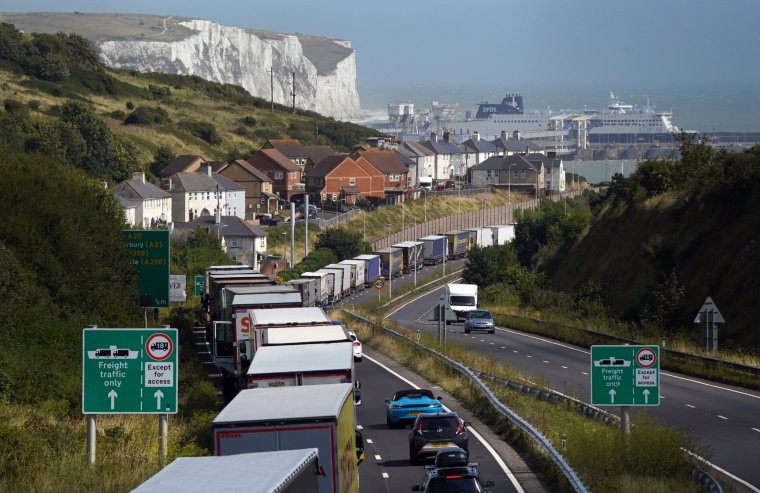 Lorries queue for the Port of Dover in Kent ahead of the August bank holiday weekend. Storm Lilian is set to surge through northern parts of Wales and England. Gusts of up to 80mph are expected, with travel disruption, flooding, power cuts and dangerous conditions near coastal areas all likely. Picture date: Friday August 23, 2024. PA Photo. See PA story WEATHER Lilian. Photo credit should read: Gareth Fuller/PA Wire