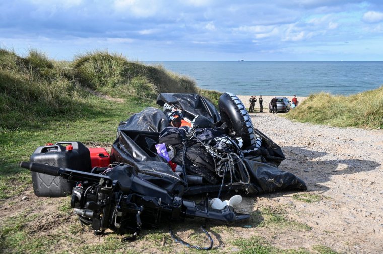 TOPSHOT - This photograph taken on September 15, 2024 shows a damaged migrants' boat after a failed attempt to cross the English Channel that led to the death of 8 people near the beach of Ambleteuse, northern France. Eight migrants died when their clandestine boat sank off Ambleteuse (Pas-de-Calais) on September 15, 2024, bringing to over 45 the number of would-be exiles to Britain who died in the Channel in 2024. (Photo by Bernard BARRON / AFP) (Photo by BERNARD BARRON/AFP via Getty Images)