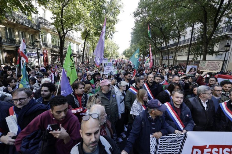 French left-wing La France Insoumise (LFI) party founder Jean-Luc Melenchon (front 3R) takes part in a rally ogarnised by the association France Palestine Solidarite (AFPS) in support of the Palestinian people, in Paris, on October 5, 2024. (Photo by STEPHANE DE SAKUTIN / AFP) (Photo by STEPHANE DE SAKUTIN/AFP via Getty Images)