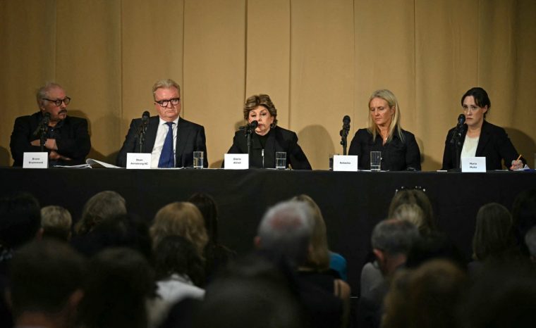 Natacha, one of the alleged victims of Mohamed al-Fayed, seen here second from the right, appeared in front of reporters with the Harrods Survivors legal team last month (Photo: BEN STANSALL / AFP via Getty Images)