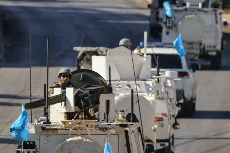 Vehicles from he United Nations Interim Force in Lebanon (UNIFIL) patrol in Marjayoun in southern Lebanon on October 12, 2024. UNIFIL, which says it has come under repeated fire in the Israeli-Hezbollah war in recent days, has patrolled the troubled border for decades. (Photo by AFP) (Photo by -/AFP via Getty Images)