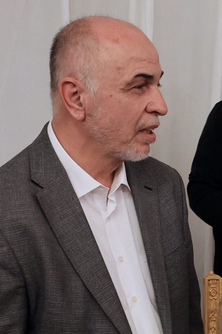 Mohammed Ismail Darwish, known as Abu Omar Hassan, the chairman of Hamas' consultative council, attends the funeral of the Palestinian movement's political leader Ismail Haniyeh in the Qatari capital Doha on August 2, 2024. (Photo by Mahmud Hams / AFP) (Photo by MAHMUD HAMS/AFP via Getty Images)