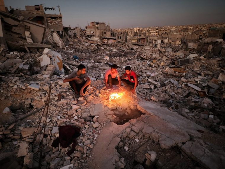 KHAN YUNIS, GAZA - OCTOBER 20: Palestinians continue to live among the rubble of houses destroyed in the Israeli attacks as there are almost no solid structures left in the city due to Israel's attacks on Gaza for more than a year, in Khan Yunis, Gaza on October 20, 2024. (Photo by Hani Alshaer/Anadolu via Getty Images)