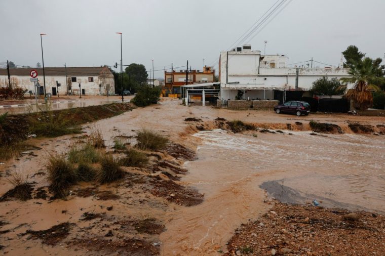 Roads are covered by flooding after the Spanish meteorological agency put the Valencia region in the highest red alert for extreme rainfalls, in Llombai, Valencia, Spain, October 29, 2024. REUTERS/Eva Manez