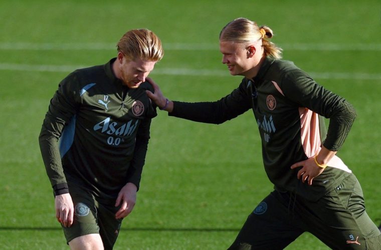 Soccer Football - Champions League - Manchester City Training - Etihad Campus, Manchester, Britain - October 22, 2024 Manchester City's Kevin De Bruyne and Erling Haaland during training Action Images via Reuters/Andrew Boyers