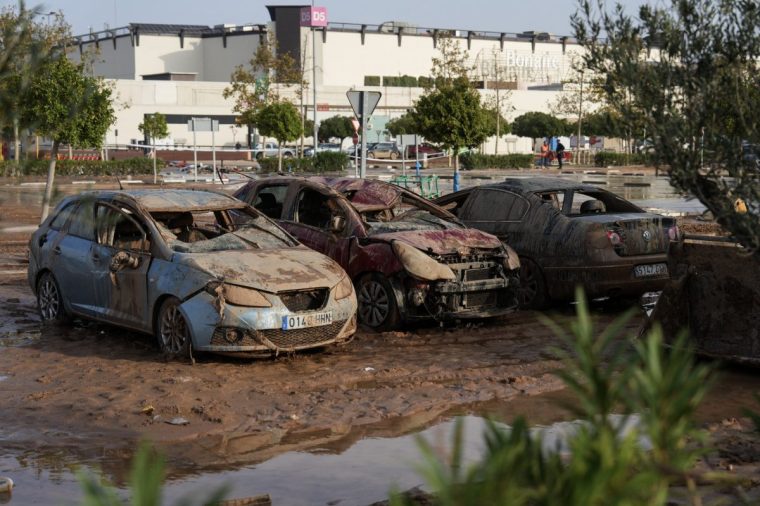 Flood damaged cars are seen outside the Bonaire shopping mall on the outskirts of Valencia, eastern Spain, on November 5, 2024, following devastating floods. The death toll from Spain's worst floods in a generation has climbed to 217, according to resuers. (Photo by Cesar Manso / AFP) (Photo by CESAR MANSO/AFP via Getty Images)