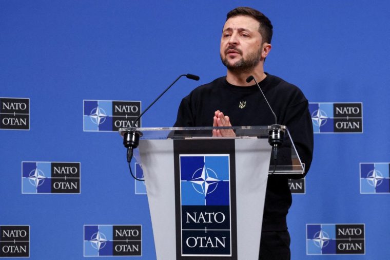 FILE PHOTO: Ukraine's President Volodymyr Zelenskiy attends a press conference, at the NATO headquarters in Brussels, Belgium October 17, 2024. REUTERS/Yves Herman/File Photo