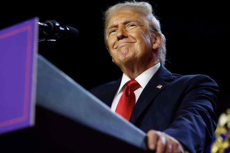 WEST PALM BEACH, FLORIDA - NOVEMBER 06: Republican presidential nominee, former U.S. President Donald Trump arrives to speak during an election night event at the Palm Beach Convention Center on November 06, 2024 in West Palm Beach, Florida. Americans cast their ballots today in the presidential race between Republican nominee former President Donald Trump and Vice President Kamala Harris, as well as multiple state elections that will determine the balance of power in Congress. (Photo by Chip Somodevilla/Getty Images)