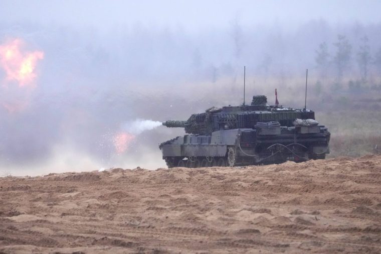 Royal Danish army Leopard 2 tank fires during NATO Enhanced Forward Presence battle group "Resolute Warrior" military exercise in Adazi, Latvia November 14, 2024. REUTERS/Ints Kalnins