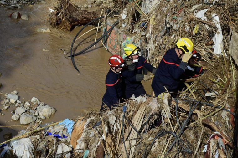 French firefighters work in search and relief efforts in Catarroja, south of Valencia, eastern Spain, on November 14, 2024, in the aftermath of deadly flooding. Some 50 French firefighters arrived to assist Spain under the auspices of the European Commission's Civil Protection and Humanitarian Aid Operations (Photo by Jose Jordan / AFP) (Photo by JOSE JORDAN/AFP via Getty Images)