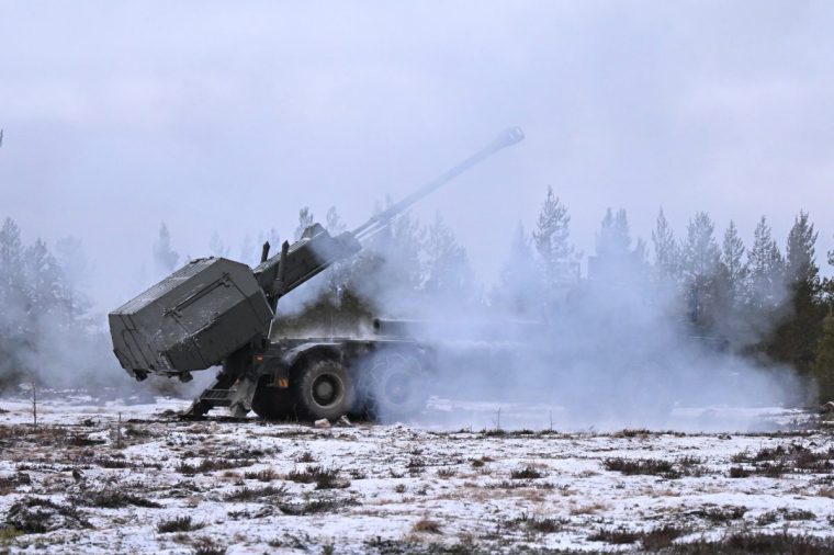 ROVANIEMI, FINLAND - NOVEMBER 18: Members of 19 Regiment Royal Artillery fire shells from an Archer mobile Howitzer during live fire testing on November 18, 2024 in Rovaniemi, Finland. The live-fire exercise includes service members from 28 Allied and partner nations, and is taking place between November 4-24, across locations in Finland, Estonia, Germany, Poland, and Romania. (Photo by Leon Neal/Getty Images)