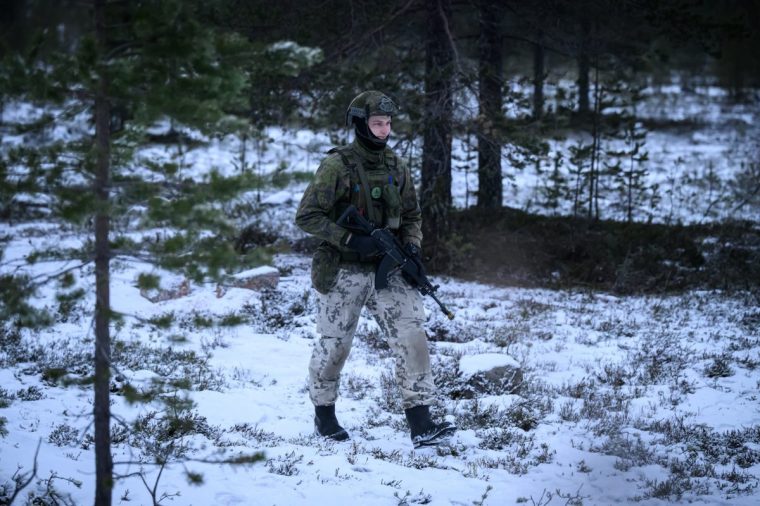 ROVANIEMI, FINLAND - NOVEMBER 18: Sergeant Olli Myllymaki of the Finnish artillery Karelia Brigade walks through the site following live fire testing of the K9 artillery system on November 18, 2024 in Rovaniemi, Finland. The live-fire exercise includes service members from 28 Allied and partner nations, and is taking place between November 4-24, across locations in Finland, Estonia, Germany, Poland, and Romania. (Photo by Leon Neal/Getty Images)