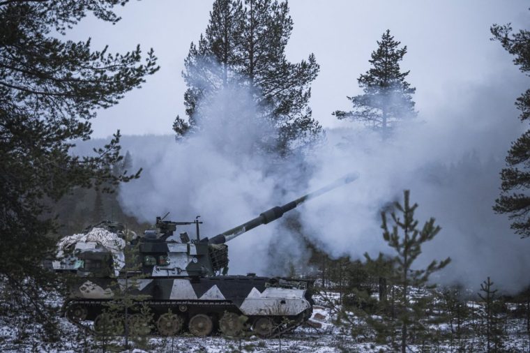 The K9 artillery, a 155 mm self-propelled howitzer, known for its high mobility, accuracy, and firepower, operated by the Karelia Brigade, one of the three Finnish Army readiness brigades, fires during the NATO Exercise Dynamic Front, on November 18, 2024 near Rovaniemi, in Finnish Lapland. Exercise Dynamic Front is a large-scale multinational field artillery exercise conducted by NATO. The exercise increases the lethality of the Alliance through long-distance fires, builds unit readiness in a complex joint, multi-national environment, and leverages host nation capabilities to increase USARUER-AF's operational reach. (Photo by Jonathan NACKSTRAND / AFP) (Photo by JONATHAN NACKSTRAND/AFP via Getty Images)