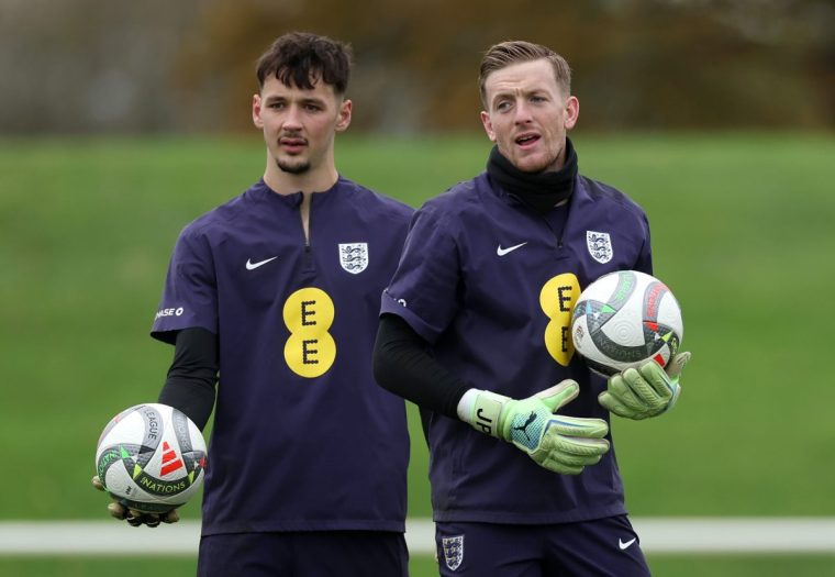 BURTON-UPON-TRENT, ENGLAND - NOVEMBER 12: James Trafford and Jordan Pickford of England look on during a training session at St Georges Park on November 12, 2024 in Burton-upon-Trent, England. (Photo by Eddie Keogh - The FA/The FA via Getty Images)