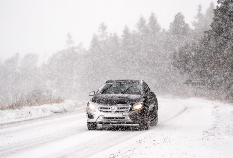 A car navigates snowy conditions on the A169 near Saltergate in the North York Moors National Park. There is widespread travel disruption after heavy snowfall and ice affected parts of the UK, with the Met Office advising vehicles could be stranded, power cuts may occur and rural areas could be cut off. Picture date: Wednesday November 20, 2024. PA Photo. Photo credit should read: Danny Lawson/PA Wire