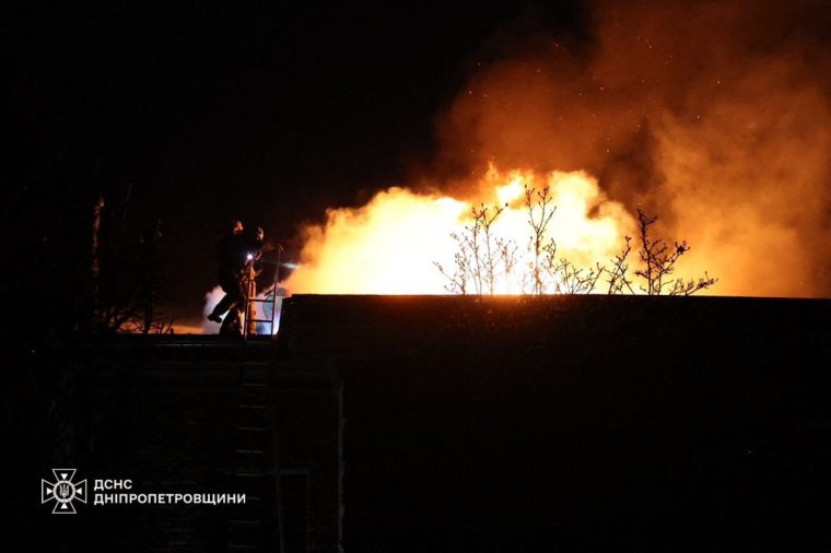 This handout photograph taken and released by the Ukrainian Emergency Service on November 21, 2024 shows Ukrainian firefighters work on a spot following an air-attack, in Dnipro, amid the Russian invasion of Ukraine. Moscow on Thursday launched an intercontinental ballistic missile at Ukraine for the first time, Kyiv said, marking the latest escalation of the conflict after Ukraine fired Western-supplied long-range missiles on Russia. The Ukrainian air force said Russian forces had used the missile in an early morning attack on the city of Dnipro, while a source confirmed to AFP it was the first such use of the weapon by Moscow since the invasion in 2022. (Photo by Handout / State Emergency Service of Ukraine / AFP) / RESTRICTED TO EDITORIAL USE - MANDATORY CREDIT "AFP PHOTO / UKRAINIAN EMERGENCY SERVICE" - NO MARKETING NO ADVERTISING CAMPAIGNS - DISTRIBUTED AS A SERVICE TO CLIENTS (Photo by HANDOUT/State Emergency Service of Ukraine/AFP via Getty Images)