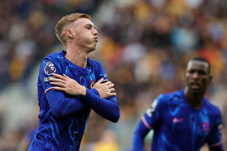 WOLVERHAMPTON, ENGLAND - AUGUST 25: Cole Palmer of Chelsea celebrates scoring his team's second goal during the Premier League match between Wolverhampton Wanderers FC and Chelsea FC at Molineux on August 25, 2024 in Wolverhampton, England. (Photo by David Rogers/Getty Images)