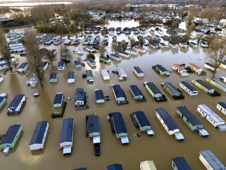 Flooded caravans at Billing Aquadrome Holiday Park near Northampton, Northamptonshire. Storm Bert will continue to bring disruption into Monday after torrential downpours caused "devastating" flooding over the weekend. Picture date: Monday November 25, 2024. PA Photo. See PA story WEATHER Bert. Photo credit should read: Jordan Pettitt/PA Wire