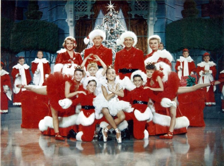 Rosemary Clooney, Danny Kaye, Bing Crosby, Vera-Ellen and children pose for picture in a scene from the film 'White Christmas', 1954. (Photo by Paramount/Getty Images)