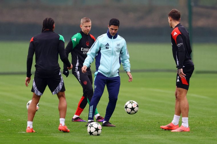 Soccer Football - Champions League - Arsenal Training - Arsenal Training Centre, London Colney, Britain - November 5, 2024 Arsenal manager Mikel Arteta and Oleksandr Zinchenko during training Action Images via Reuters/Matthew Childs