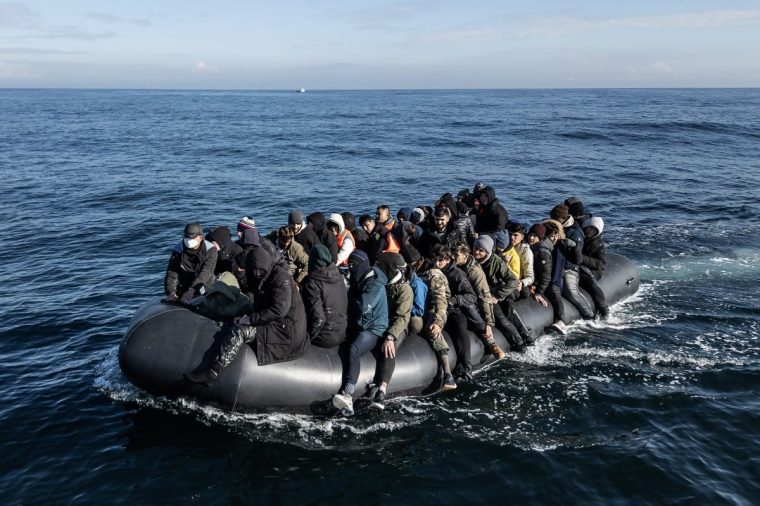 2024 YEAR IN REVIEW ??? NEWS - ENGLISH CHANNEL - MARCH 06: An inflatable dinghy carrying around 65 migrants crosses the English Channel on March 06, 2024 in the English Channel. According to official figures 401 migrants arrived in the UK by small boat on Monday, the busiest day of the year so far for Channel crossings. This brings the provisional total number of UK arrivals so far this year to 2,983. Government data indicates this is more than the 2,953 logged this time last year and surpasses the running totals documented between January 1 and March 4 each year since current records began in 2018. (Photo by Dan Kitwood/Getty Images)