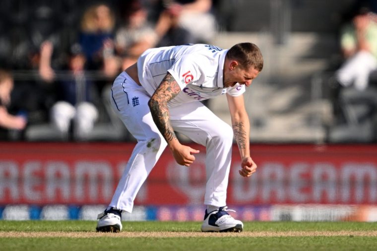 CHRISTCHURCH, NEW ZEALAND - NOVEMBER 30: Brydon Carse of England celebrates after dismissing Glenn Phillips of New Zealand during day three of the First Test match in the series between New Zealand and England at Hagley Oval on November 30, 2024 in Christchurch, New Zealand. (Photo by Joe Allison/Getty Images)