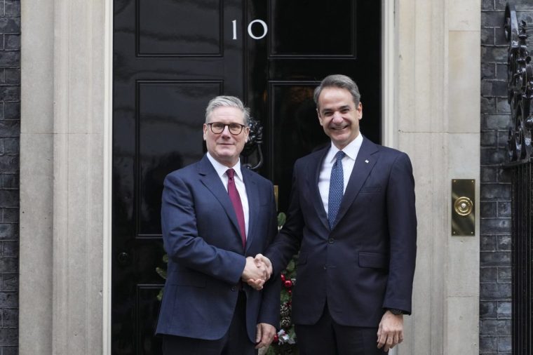 Britain's Prime Minister Keir Starmer welcomes his Greek counterpart Kyriakos Mitsotakis to 10 Downing Street in London, Tuesday, Dec. 3, 2024. (AP Photo/Kirsty Wigglesworth)