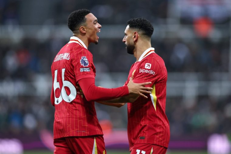 NEWCASTLE UPON TYNE, ENGLAND - DECEMBER 4: Trent Alexander-Arnold of Liverpool and Mohamed Salah of Liverpool during the Premier League match between Newcastle United FC and Liverpool FC at St James' Park on December 4, 2024 in Newcastle upon Tyne, England. (Photo by Robbie Jay Barratt - AMA/Getty Images)