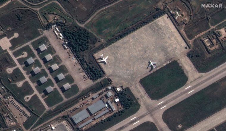 A satellite image shows Russian aircraft, helicopters and military equipment at Khmeimim airbase, near Latakia, Syria December 9, 2024. Maxar Technologies/Handout via REUTERS NO RESALES. NO ARCHIVES. THIS IMAGE HAS BEEN SUPPLIED BY A THIRD PARTY. MANDATORY CREDIT. MUST NOT OBSCURE LOGO.