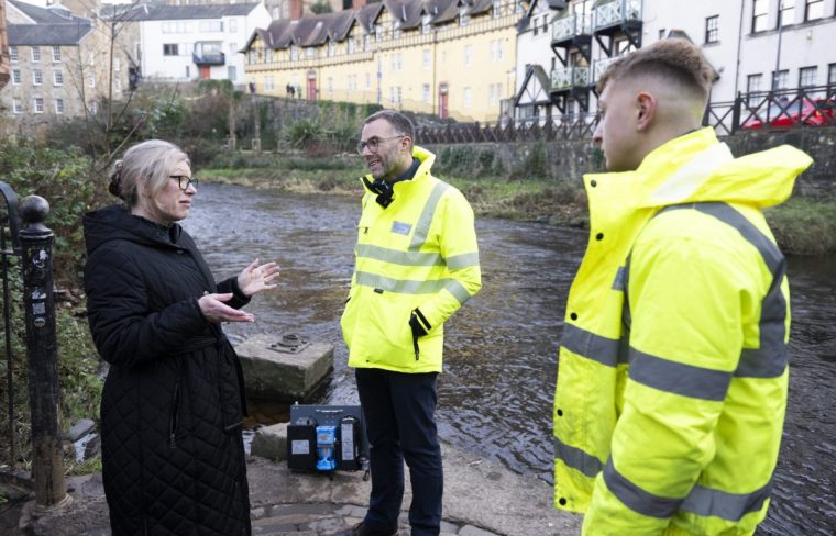 SNP Energy Secretary Gillian Martin with Scottish Water officials, as new monitors installed at the Water of Leith in Edinburgh, December 2024 (Photo by Paul Devlin / SNS Group)