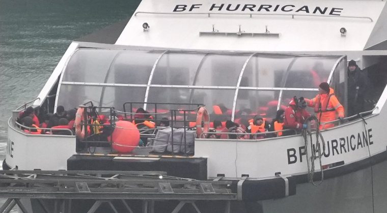 A group of people thought to be migrants are brought in to Dover, Kent, onboard a Border Force vessel following a small boat incident in the Channel. Picture date: Thursday December 12, 2024. PA Photo. Photo credit should read: Gareth Fuller/PA Wire