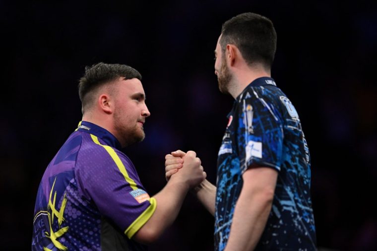 LONDON, ENGLAND - MAY 23: Luke Littler of England celebrates after getting a 9 dart finish the Final against Luke Humphries of England at the 2024 BetMGM Premier League Darts Play-Offs at The O2 Arena on May 23, 2024 in London, England. (Photo by Justin Setterfield/Getty Images)