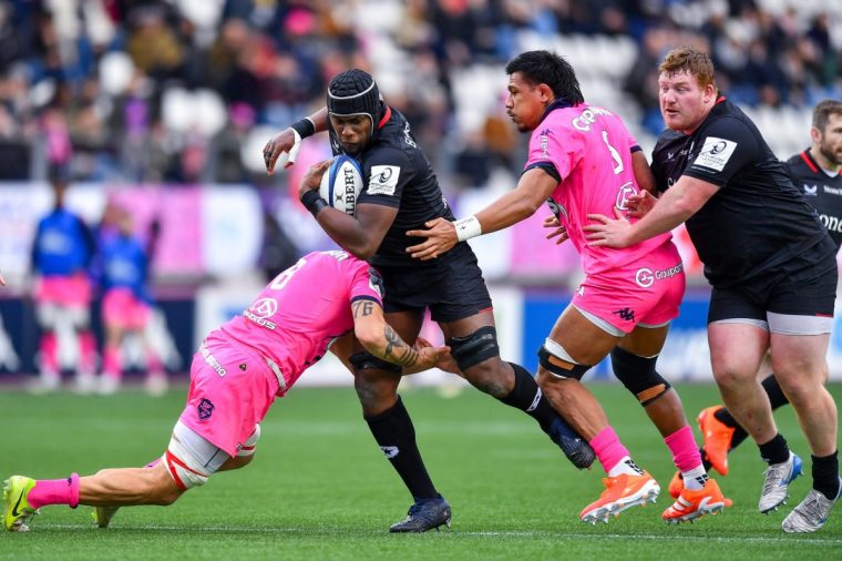 PARIS, FRANCE - DECEMBER 15: Maro Itoje of Saracens is tackled by Juan Martin Scelzo of Stade Francais during the Investec Champions Cup match between Stade Francais Paris and Saracens at Stade Jean Bouin on December 15, 2024 in Paris, France. (Photo by Franco Arland/Getty Images)