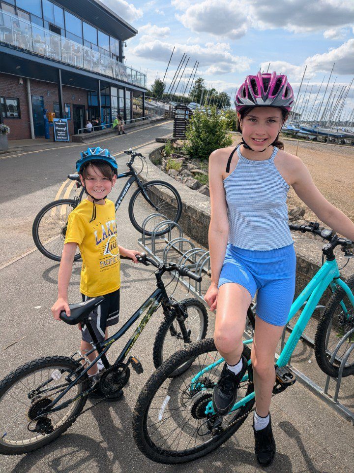 Rowan McDonnell, eight set himself a cycling challenge to cycle as many laps as possible of Draycote Water reservoir as he could in one day. Rowan with sister Amelie, 11 (Photo: supplied by Action for Children)