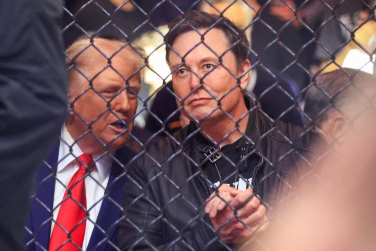 (FILES) US President-elect Donald Trump (L) and Tesla and SpaceX CEO Elon Musk watch a fight during UFC 309 at Madison Square Garden in New York, on November 16, 2024. The US House of Representatives on December 19, 2024 overwhelmingly rejected a Republican-led funding bill aimed at averting a government shutdown, with federal agencies due to run out of cash on Friday night and cease operations starting this weekend. Several political allies of Trump were also in attendance including entrepreneurs Elon Musk and Vivek Ramaswamy, who have been asked by Trump to lead efforts to cut government inefficiency. (Photo by Kena Betancur / AFP) (Photo by KENA BETANCUR/AFP via Getty Images)