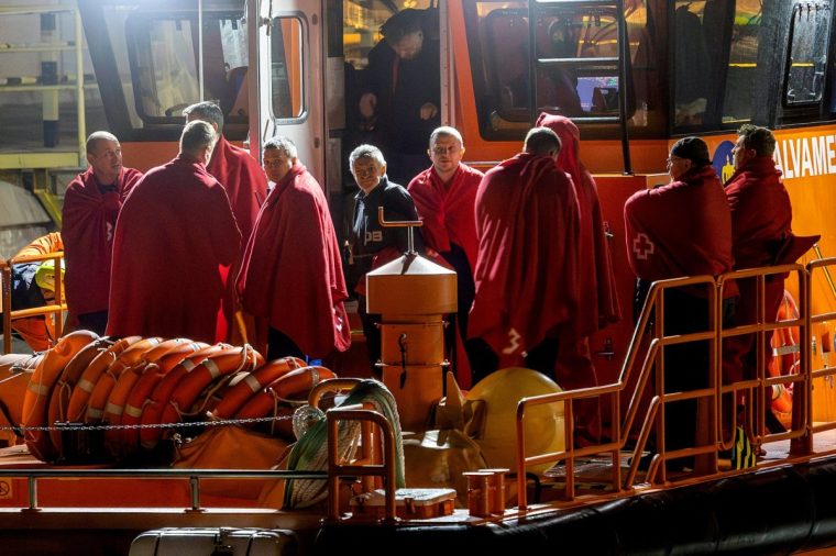 Survivors of the sinking of Russian cargo ship Ursa Major stand on the deck of a Spanish Maritime Rescue ship upon arrival at the port of Cartagena, Spain, December 23, 2024. REUTERS/Jose Maria Rodriguez TPX IMAGES OF THE DAY