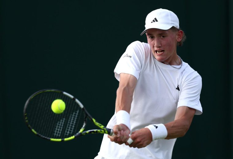 LONDON, ENGLAND - JULY 02: Henry Searle of Great Britain plays a backhand against Marcos Giron in his Gentlemen's Singles first round match during day two of The Championships Wimbledon 2024 at All England Lawn Tennis and Croquet Club on July 02, 2024 in London, England. (Photo by Francois Nel/Getty Images)