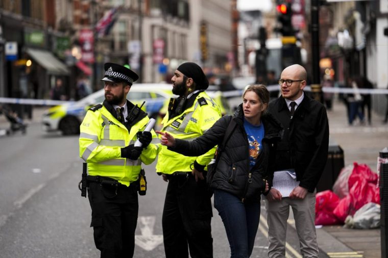 The scene on Shaftesbury Avenue in central London after four people were injured, one seriously, by a car which was driven onto a pavement in central London in the early hours of Christmas Day. A 31-year-old man has been arrested on suspicion of attempted murder. Picture date: Wednesday December 25, 2024. PA Photo. See PA story POLICE Shaftesbury. Photo credit should read: Jordan Pettitt/PA Wire