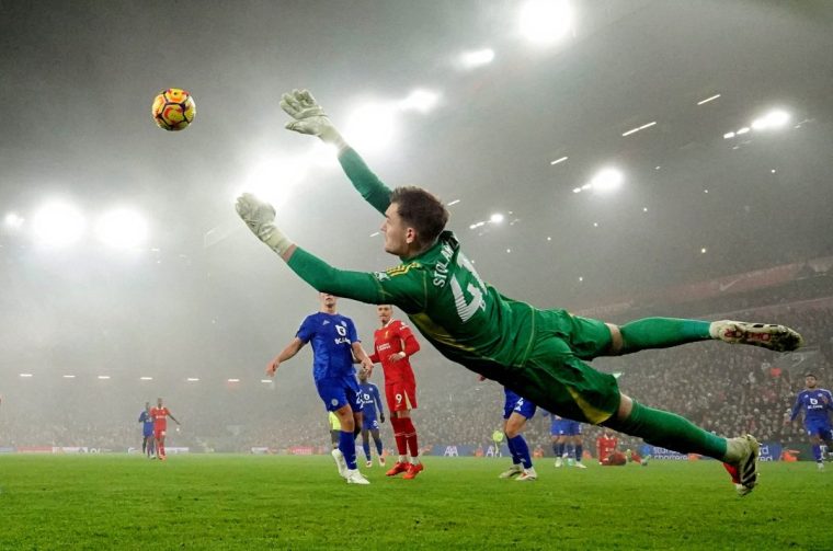 Soccer Football - Premier League - Liverpool v Leicester City - Anfield, Liverpool, Britain - December 26, 2024 Liverpool's Cody Gakpo scores their first goal past Leicester City's Jakub Stolarczyk REUTERS/David Klein EDITORIAL USE ONLY. NO USE WITH UNAUTHORIZED AUDIO, VIDEO, DATA, FIXTURE LISTS, CLUB/LEAGUE LOGOS OR 'LIVE' SERVICES. ONLINE IN-MATCH USE LIMITED TO 120 IMAGES, NO VIDEO EMULATION. NO USE IN BETTING, GAMES OR SINGLE CLUB/LEAGUE/PLAYER PUBLICATIONS. PLEASE CONTACT YOUR ACCOUNT REPRESENTATIVE FOR FURTHER DETAILS..