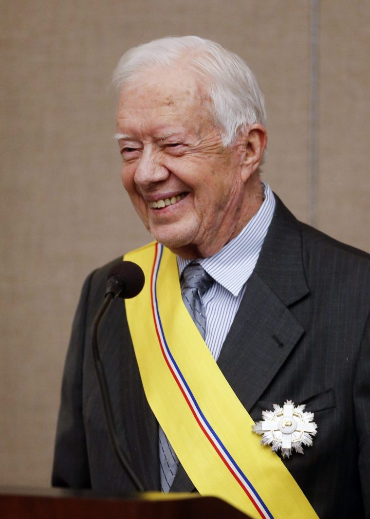 FILE - Former President Jimmy Carter addresses the audience after being awarded the Order of Manuel Amador Guerrero by Panamanian President Juan Carlos Varela during a ceremony at the Carter Center in Atlanta, Jan. 14, 2016. The award, named for Panama's first president, recognizes distinguished people in the areas of politics, science and the arts. (AP Photo/John Bazemore, File)