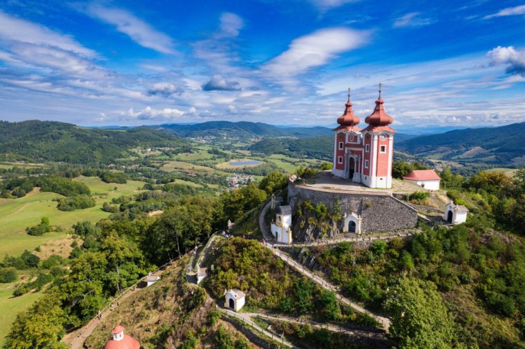 Aerial view above the beautiful Slovakian village Bansk?? ??tiavnica in Slovakia during summer