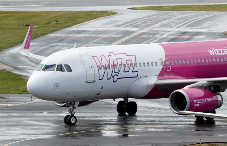 FILE PHOTO: A Wizz Air Airbus A320 at Luton Airport, Luton, Britain, May 1, 2020. REUTERS/Andrew Boyers/File Photo