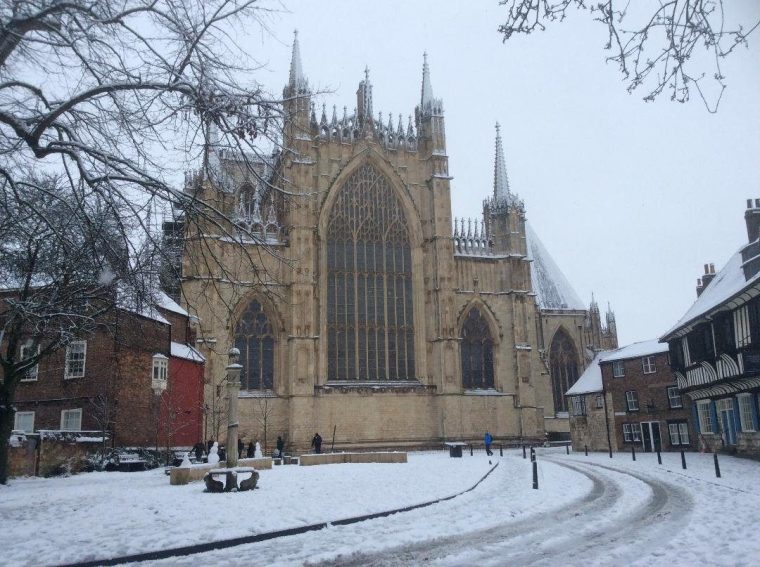 York Minster after overnight snowfall. Heavy overnight snow is causing disruption across parts of the UK as the cold start to the new year continues. Picture date: Sunday January 5, 2025. PA Photo. Two amber weather warnings from the Met Office have been put in place in England and Wales, with 3cm to 7cm of snowfall predicted for much of the affected area, mixing with rain at times in lower-lying areas. The Met Office said Bingley, West Yorkshire, had seen 12cm of snow up to 7am on Sunday, with Shap in Cumbria and Capel Curig, Gwynedd, both seeing 10cm. One amber warning for snow and freezing rain, which covers much of Wales and the Midlands as far north as Manchester, is in place until midday on Sunday. See PA story WEATHER Winter. Photo credit should read: Tom Ross/PA Wire