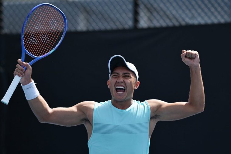 MELBOURNE, AUSTRALIA - JANUARY 13: James McCabe of Australia celebrates winning against Martin Landaluce of Spain in the Men's Singles First Round match during day two of the 2025 Australian Open at Melbourne Park on January 13, 2025 in Melbourne, Australia. (Photo by Hannah Peters/Getty Images)