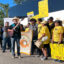 Supporters of the Radiation Exposure Compensation Act sing about saving the program on Sept. 22 before leaving Albuquerque, New Mexico for Washington, D.C. Credit: Noel Lyn Smith/Inside Climate News