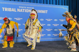 Indigenous federal employees perform a traditional dance before President Joe Biden's visit to the White House Tribal Nations Summit on Dec. 9 in Washington, D.C. Credit: Noel Lyn Smith/Inside Climate News