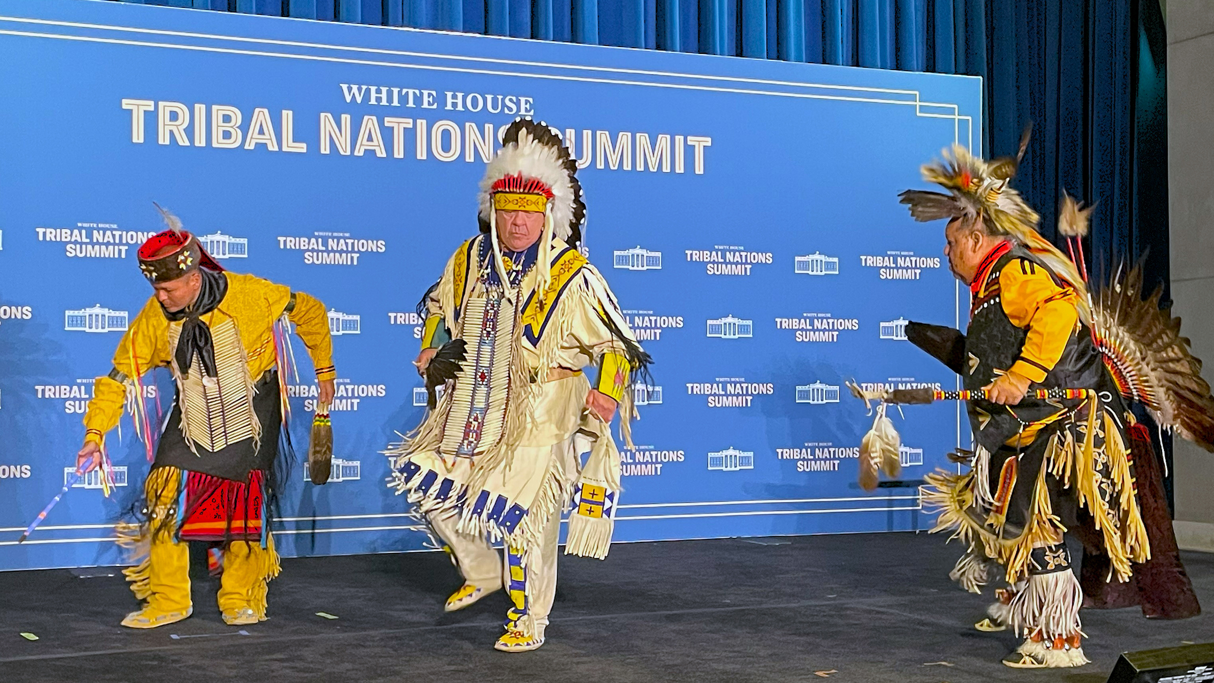 Indigenous federal employees perform a traditional dance before President Joe Biden's visit to the White House Tribal Nations Summit on Dec. 9 in Washington, D.C. Credit: Noel Lyn Smith/Inside Climate News